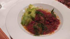 Polpette al pomodoro con zucchine at Snow Restaurant in Sinaia
