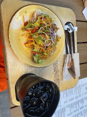 Tostadas and peach iced teaa  at Madness Specialty Coffee in Alicante
