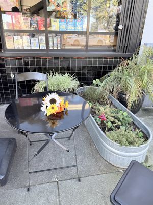 Outdoor seating in front of market   at Blue Fog Market in San Francisco