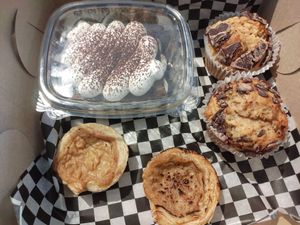 Tiramisu, muffins and Portuguese custard at Aunty Em's Deli & Coffee in Toronto