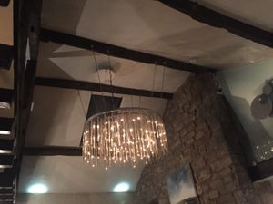 Beautiful glass chandelier upstairs  at The Moon in Kendal