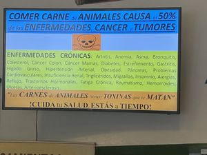 Healthy propaganda :-) at Darshan Vegetarian Restaurant in Iquitos