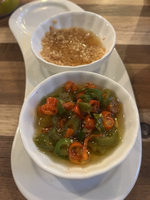 Condiments- chopped garlic in oil and chopped chili  at Pizzasaurus in Cape Town