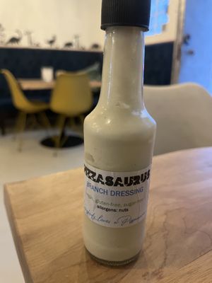 Condiments- chopped garlic in oil and chopped chili peppers in oil  at Pizzasaurus in Cape Town