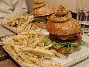 Burgers were looking fine (didn't taste these). at Cheeky Leeks in Lisbon