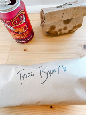 Sandwich, chips and Panacea Booch.  at The Half in Wilmington