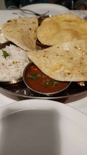 Thali hiding under all the gorgeous bread at SuRano Plant Based Indian bistro in Beeston