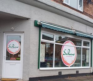 Lovely, clear signage outside at SuRano Plant Based Indian bistro in Beeston