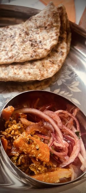 Lunch menu - Jeera Rice and flatbread with Seasonal Vegetable Sabji and Dhal dishes.  at SuRano Plant Based Indian bistro in Beeston