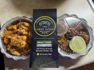 Lasooni Gobi and Vegetable Pakora, two of the 6 vegan dishes well-identified on their take-out menu.   at The Curry House in Bancroft