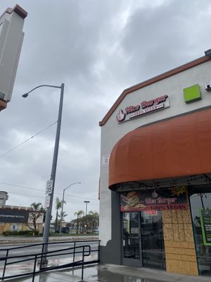 Upon Arrival - Smaller Location w/Signage Not Having High Visibility. Bummer About the Window.  at Nice Burger in Long Beach