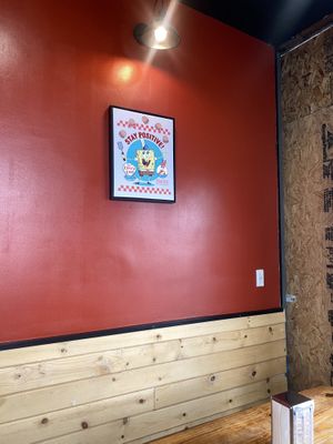 Cute Interior with Booth Seating and Stools Facing Window - It’s Cozy (Small).  at Nice Burger in Long Beach