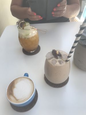 Cappuccino, the banana macca milkshake, rum cocktail   at Atheneon Bar in Kos
