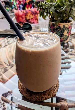 Banana, Cacao, Medjool Date and Peanut Butter Smoothie at Atheneon Bar in Kos