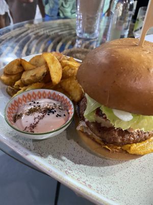 Vegan beef burger this is really good sauce with It is amazing   at Atheneon Bar in Kos