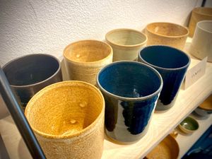 Local handmade ceramic cups for sale. 250,- at Emmylou Café in Copenhagen