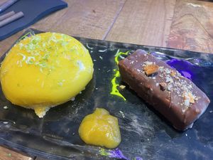 Mango mousse and snicker (two different desserts but they served it on the same plate¿?)  at Desoriente - Poblenou in Barcelona