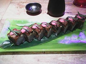 Uramaki vegan roll with kimchi and details. Okei! at Desoriente - Poblenou in Barcelona