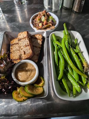 Tofu a la carte with ginger miso sauce, seasonal vegetables (green beans), and "beans and greens" at Stonecat Cafe in Hector