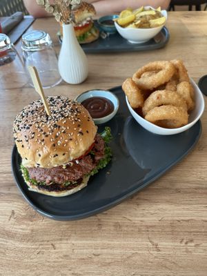 Magic Mushroom Burger (vegan) with onion rings  at Kovas in Schoenaich