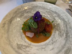 The main course options include a succulent black rice croquette served with a creamy vegan tomato sauce...  at Brocoli in Lyon