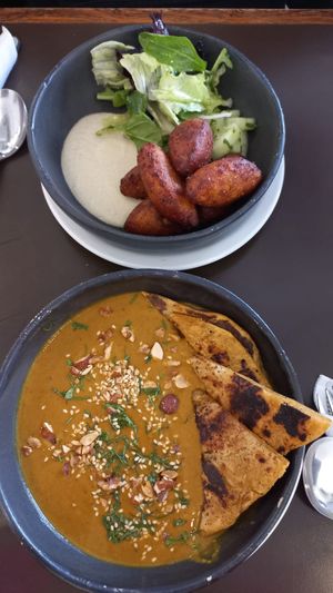 Buñuelos de maíz 🌽 y sopa curry de cabutia 😍🙏🏿  at Puerta in Buenos Aires