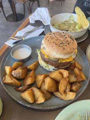 Burger and crispy potatoes  at Puerta in Buenos Aires