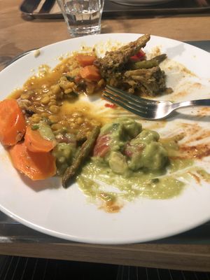 dal, curry, carrots, guac, 3/4 eaten   at 7030 Restaurant in Winterthur
