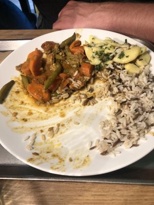 veggie curry, potatoe salad, rice, 2/3 eaten  at 7030 Restaurant in Winterthur