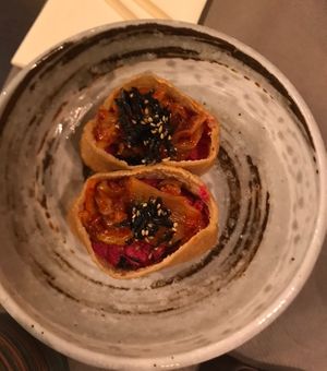 Inarisushi con riso,hummus di barbabietola e kimchi 💯   at Xiang DimSum  in Padua