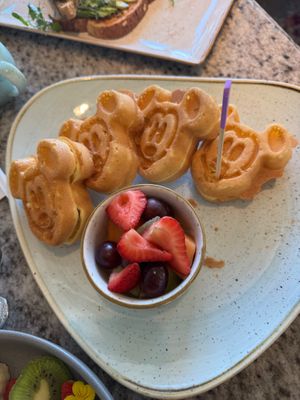 Allergy friendly Mickey waffles with fruit at Grand Floridian Cafe in Lake Buena Vista