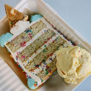 Add a scoop of ice cream to your slice of cake! at Frosty's Cake and Ice Cream in Lakewood