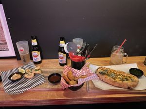 3 different starters.. foccacia, nuggets and calamari  at Vegan Pizza Bar in The Hague