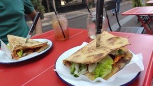 Caesar's Delight and Tuna Melt-away Tuna sandwich at Vegan Pizza Bar in The Hague