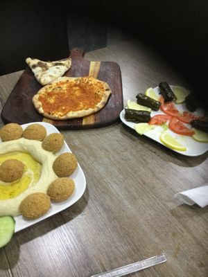 Hommos, toasted Muhammara, pastry with spinach, Yalanji. at Damaskus Kebap Haus in Bitburg