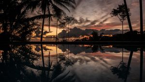 sunset in the pool. at Finca Bavaria in Uvita