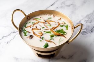 Dry Eringi Mushroom in Spicy Coconut Soup at Baanying's Plant-Based Ying's Garden  in Bangkok