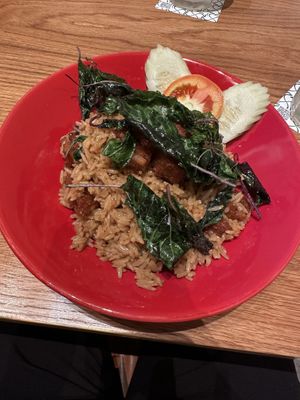 Fried basil rice with pork belly   at Baanying's Plant-Based Ying's Garden  in Bangkok