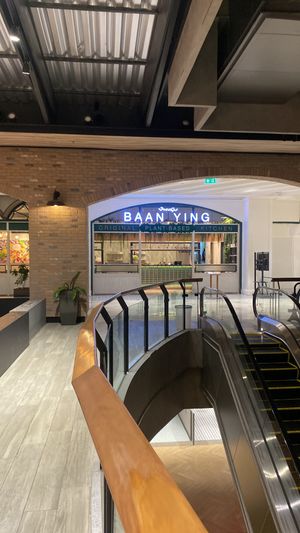 In front of escalator   at Baanying's Plant-Based Ying's Garden  in Bangkok