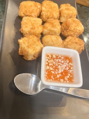 Fried tofu cubes with peanut chili sauce   at Baanying's Plant-Based Ying's Garden  in Bangkok