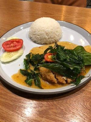 Plant-based chicken with basil - so tasty! at Baanying's Plant-Based Ying's Garden  in Bangkok