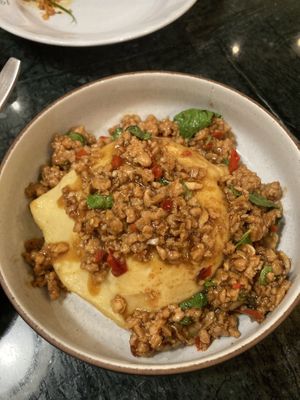 Spicy chicken omelette.   at Baanying's Plant-Based Ying's Garden  in Bangkok