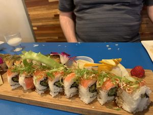 Tuna rolls. Salmon dill rolls behind them.   at The Sushi Samurai - Queen Anne in Seattle