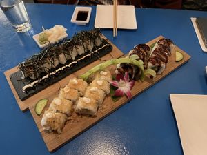 Tiger roll (left) crispy shrimp roll (lower middle) and dragon roll (right)  at The Sushi Samurai - Queen Anne in Seattle