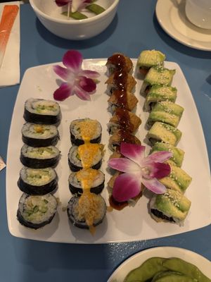 Left to right, shrimp tempura, dragon, crispy salmon, and green goddess rolls   at The Sushi Samurai - Queen Anne in Seattle
