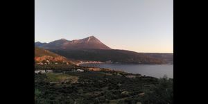 View of the bay (and restaurant) from the other side at Karabópetra in Neo Itilo