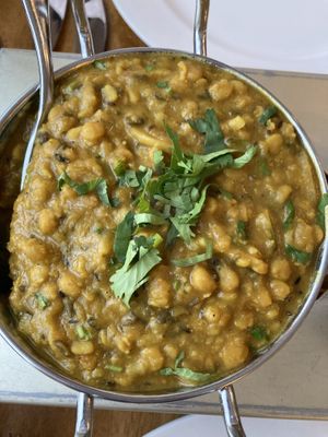 Saag Aloo (potatoes with spicy spinach creamy sauce)  at Sitar Indian Restaurant in Dundalk