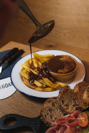 We're a Pie & Ale Pub, which means you can get yourself a delicious Pie & Chips matched to your beer. Our Pies are made by our friends at Cheeky Pies, who always have an amazing range and we will ALWAYS offer a vegan option, with vegan gravy.   at The Baby Goat House in Hamburg