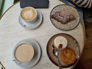 Speculos cookie, pecan tart, almond croissant, speculos coffee and a latte at Zoi Café in Lyon