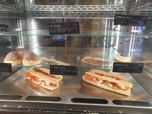 Display cabinet at Zoi Café in Lyon